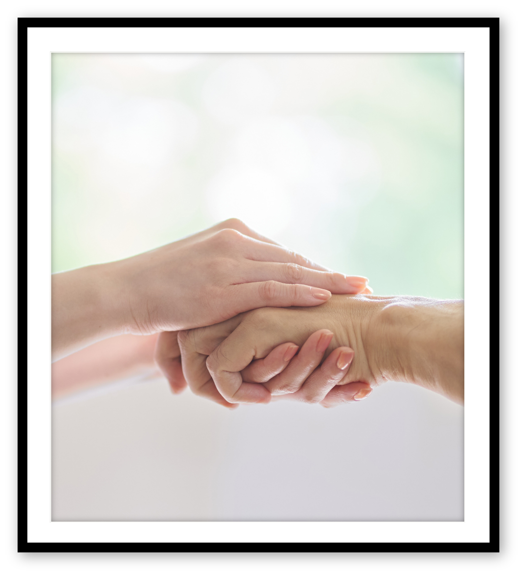 Closeup of grasping hands.